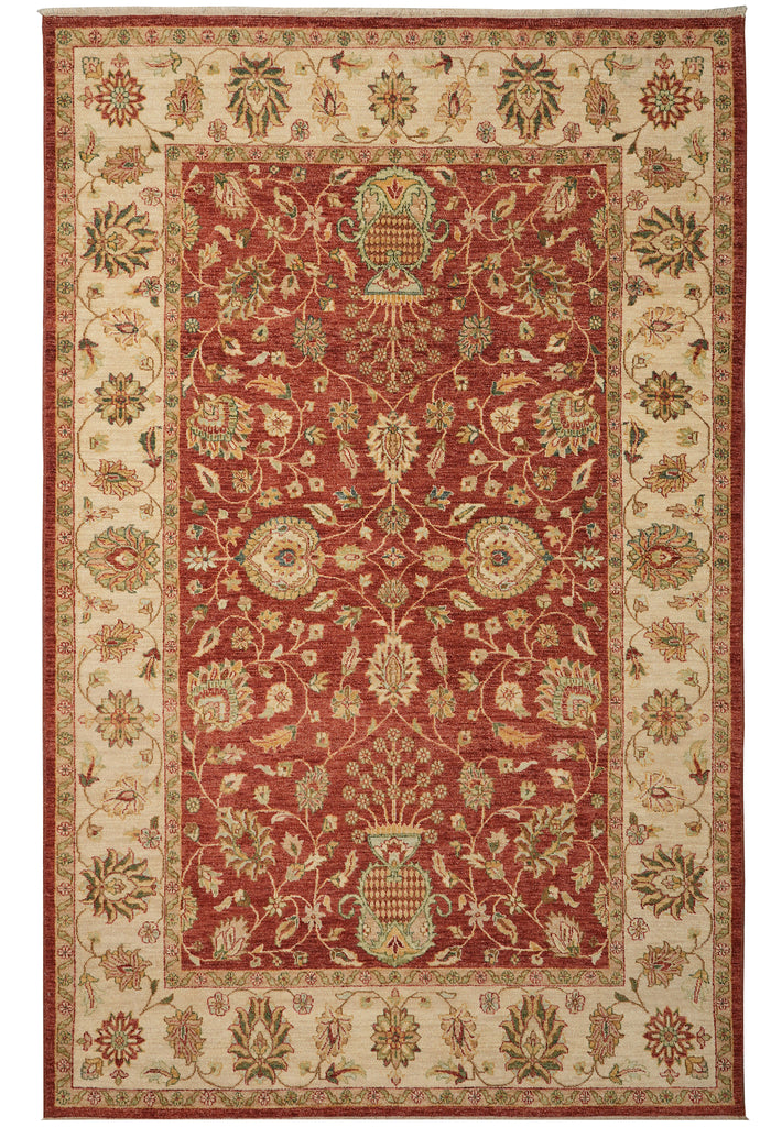 A traditional oriental area rug with an intricate floral and vine pattern, featuring a deep red central field, beige borders, and muted green and gold accents.