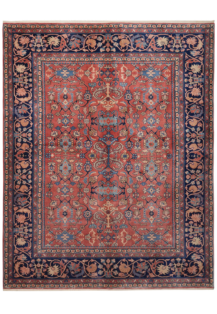 A traditional oriental area rug with a dusty red center field, navy blue borders, and beige floral motifs, shown flat against a white background.