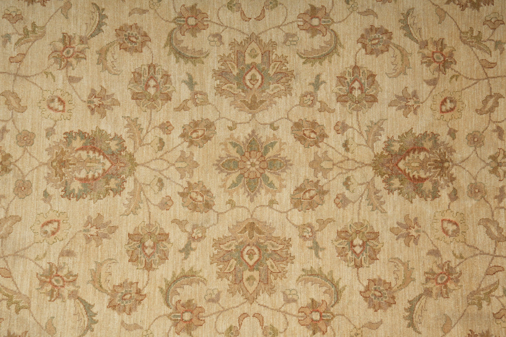 Beige damask fabric with a vintage floral and scroll pattern in muted brown, tan, and olive green tones.