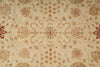 Load image into Gallery viewer, A close-up of a traditional patterned rug with a beige background and intricate floral motifs in muted red, brown, and soft green.