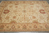 Load image into Gallery viewer, A large rectangular area rug with an intricate traditional floral and medallion pattern, featuring a warm beige base with red, green, and brown accents.