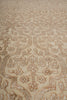 Load image into Gallery viewer, A close-up of a beige and tan patterned fabric or carpet texture with an ornate floral and scroll motif.