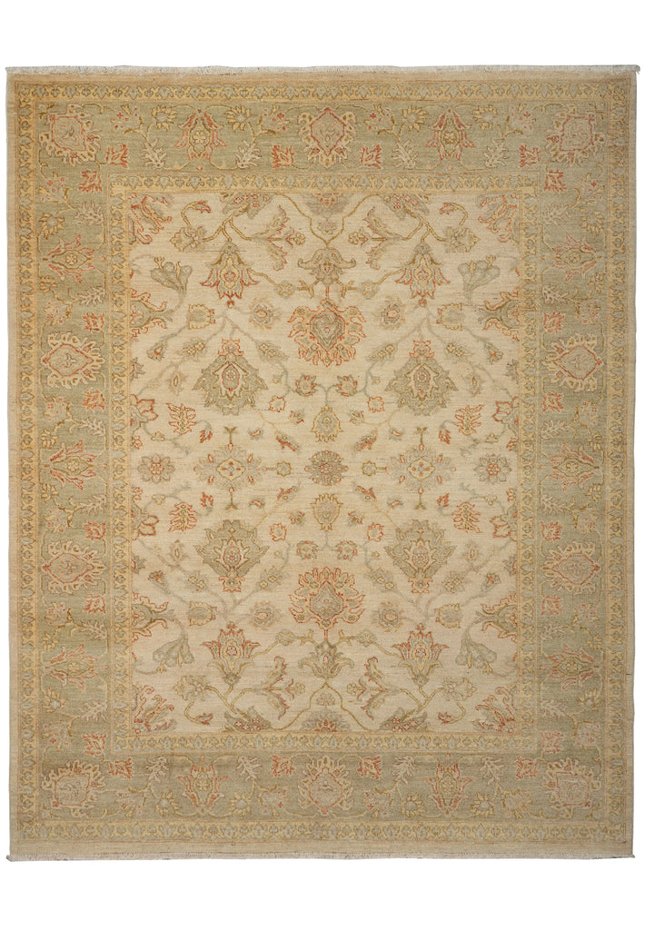 A traditional oriental-style area rug with an intricate floral and medallion pattern in beige, muted green, and soft orange tones, shown flat against a white background.