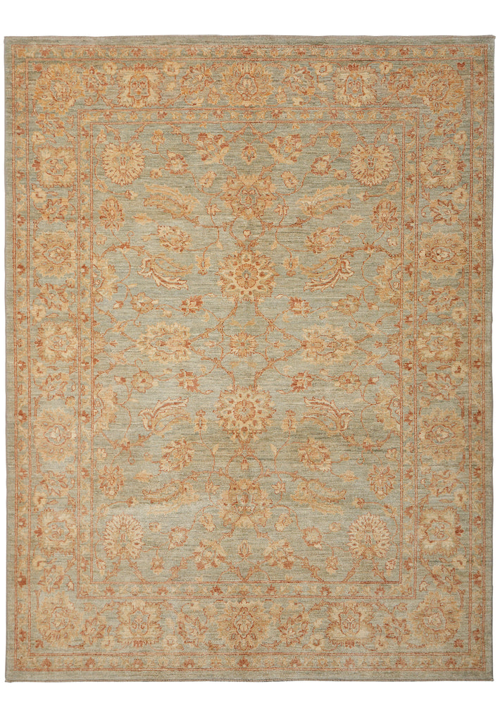 A rectangular area rug with an intricate traditional floral and medallion pattern in muted beige, tan, and dusty blue tones, shown flat against a white background.