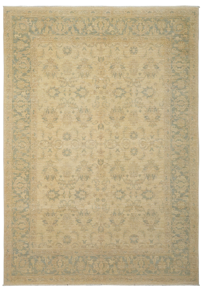 A rectangular area rug with a traditional floral pattern in muted beige, cream, and pale blue-gray tones, shown flat against a white background.