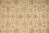 Load image into Gallery viewer, A close-up of a woven fabric or wallpaper pattern featuring ornate floral and medallion motifs in muted beige, tan, and dusty rose tones on a warm cream background.