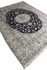 Load image into Gallery viewer, A traditional Persian-style area rug with a large central medallion, featuring a dark navy blue center surrounded by cream, beige, and light blue floral patterns and borders.