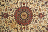 Load image into Gallery viewer, A close-up of an ornate Persian-style rug with a central floral mandala and scrolling vine motifs in beige, rust red, navy blue, and brown.