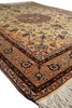 Load image into Gallery viewer, An oriental-style area rug with a traditional floral pattern, featuring a central medallion, ornate borders, and cream-colored fringe on a white background.
