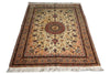 Load image into Gallery viewer, A traditional oriental area rug with a central medallion and floral motifs, featuring a warm beige field, brown and red borders, and off-white fringe on a white background.