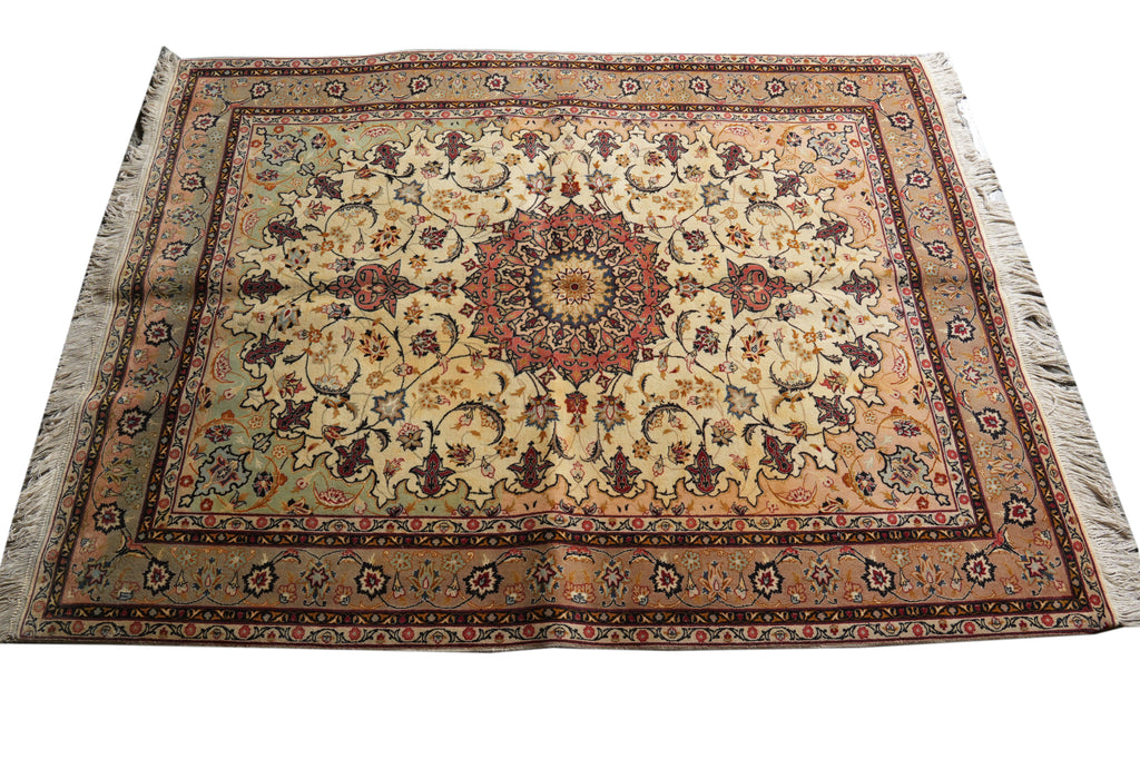 A traditional oriental area rug with a central medallion and intricate floral motifs, featuring cream, beige, red, and brown tones with white fringe on the sides.