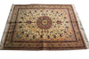 Load image into Gallery viewer, A traditional oriental area rug with a central medallion and intricate floral motifs, featuring cream, beige, red, and brown tones with white fringe on the sides.