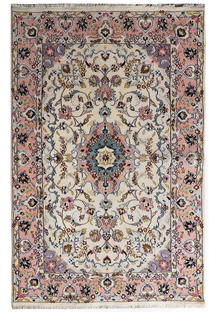 A traditional oriental-style area rug with an intricate floral and vine pattern, featuring a cream center, pink borders, and accents of blue, green, and brown.