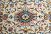 Load image into Gallery viewer, A close-up of an ornate Persian-style rug featuring a central medallion and scrolling floral motifs in soft pink, dusty blue, mustard yellow, and dark brown on a cream background.