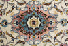 Load image into Gallery viewer, A close-up of an ornate traditional rug pattern with a central medallion in cream, dusty pink, slate blue, mustard yellow, and dark brown.
