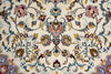 Load image into Gallery viewer, A close-up of an ornate floral patterned rug with a cream background and intricate detailing in blue, pink, gold, and purple.