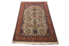 Load image into Gallery viewer, A traditional oriental area rug with an intricate floral and geometric pattern, featuring a cream center, a dark red border, and blue accents, shown flat against a white background.