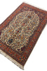 Load image into Gallery viewer, An ornate Persian-style prayer rug with a central mihrab design, featuring a cream center field, a dark red border, and blue and green floral details, shown on a white background.