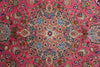 Load image into Gallery viewer, A close-up of a traditional Persian-style rug with a vibrant pink background and an intricate multicolor floral and geometric medallion pattern.