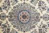 Load image into Gallery viewer, A close-up of an ornate floral patterned rug with a central medallion in cream, blue, and dusty pink tones.