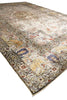Load image into Gallery viewer, An antique-style oriental area rug with a distressed cream and beige field, featuring a detailed floral border and central medallion in muted tones of blue, rust red, and gold.