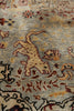 Load image into Gallery viewer, Close-up of an ornate rug or textile with a beige animal motif on a muted gray-beige background, surrounded by red, brown, and black floral and scroll patterns.