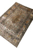 Load image into Gallery viewer, An antique-style Persian area rug with a distressed, faded design, featuring a central medallion and intricate floral motifs in muted beige, brown, gray, and rust orange tones, shown on a plain white background.