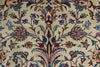 Load image into Gallery viewer, Close-up of an ornate floral patterned textile or rug with a cream background and detailed botanical motifs in blue, red, green, and brown.