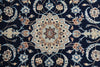 Load image into Gallery viewer, A close-up of an ornate traditional rug featuring a central medallion and scrolling floral motifs in navy blue, beige, light blue, and rust brown.