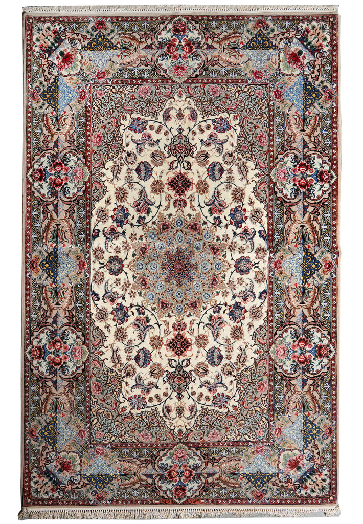A traditional oriental-style area rug with an intricate floral and medallion pattern, featuring a cream center, red and blue borders, and cream fringe on the top and bottom.