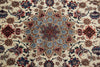 Load image into Gallery viewer, A close-up of an ornate traditional patterned rug with a central medallion and surrounding floral motifs in cream, blue, red, brown, and green.