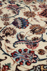 Load image into Gallery viewer, A close-up of an ornate floral and paisley patterned rug or textile on a cream background, with red, blue, brown, and black motifs.