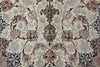 Load image into Gallery viewer, A close-up of an ornate traditional patterned rug with a central medallion and scrolling floral motifs in cream, blue, rust red, and gray.