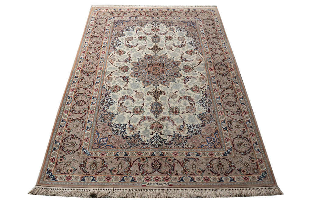 A traditional oriental area rug with an intricate floral pattern, featuring a central medallion, detailed borders, and fringed edges, shown against a plain white background.