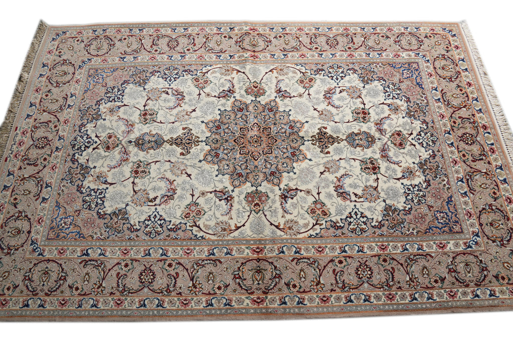 A traditional oriental-style area rug with an intricate floral pattern, featuring a central medallion, detailed borders, and fringe on the top and bottom edges.