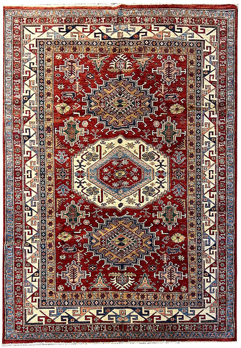 Image of a Cozy Living Room with Red Super Kazak Rug: 
