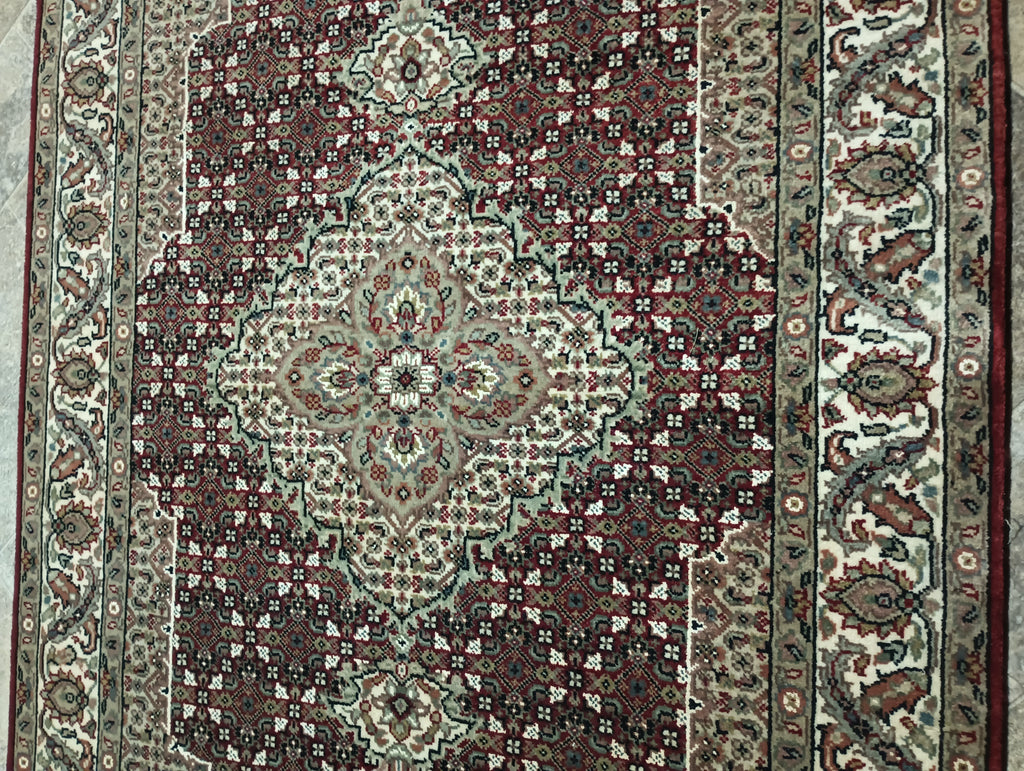 Hand-Knotted-Mahi-Tabriz-Rug.jpg