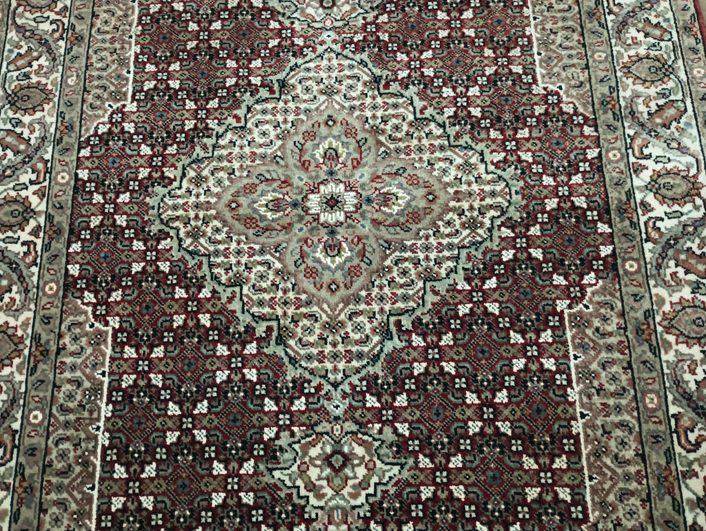Hand-Knotted-Mahi-Tabriz-Rug.jpg