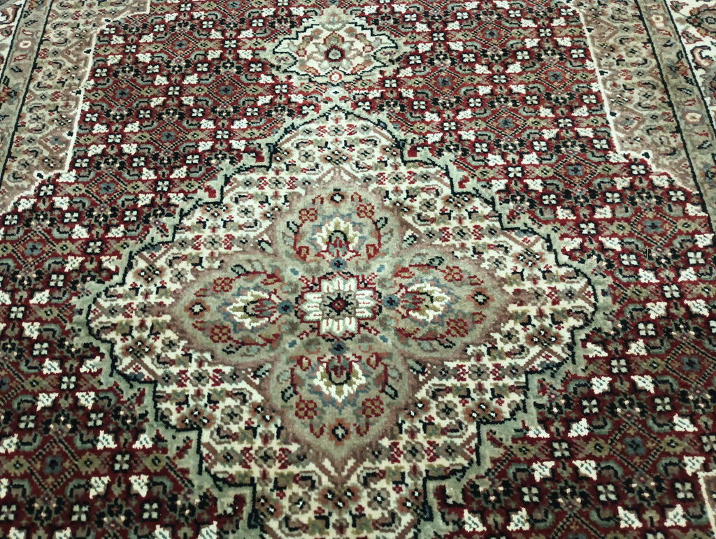 Hand-Knotted-Mahi-Tabriz-Rug.jpg