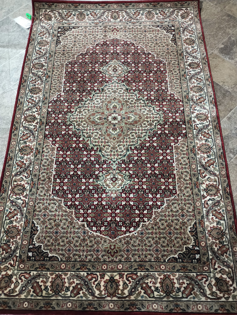 Hand-Knotted-Mahi-Tabriz-Rug.jpg