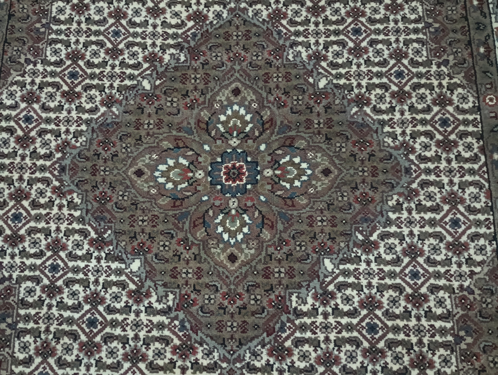 Fine-Quality-Wool-and-Silk-Rug.jpg