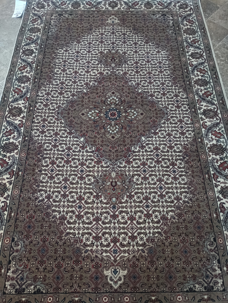 Fine-Quality-Wool-and-Silk-Rug.jpg