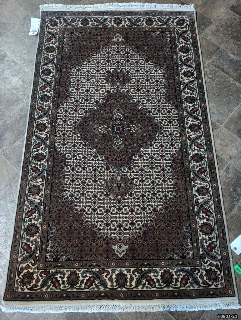 Fine-Quality-Wool-and-Silk-Rug.jpg