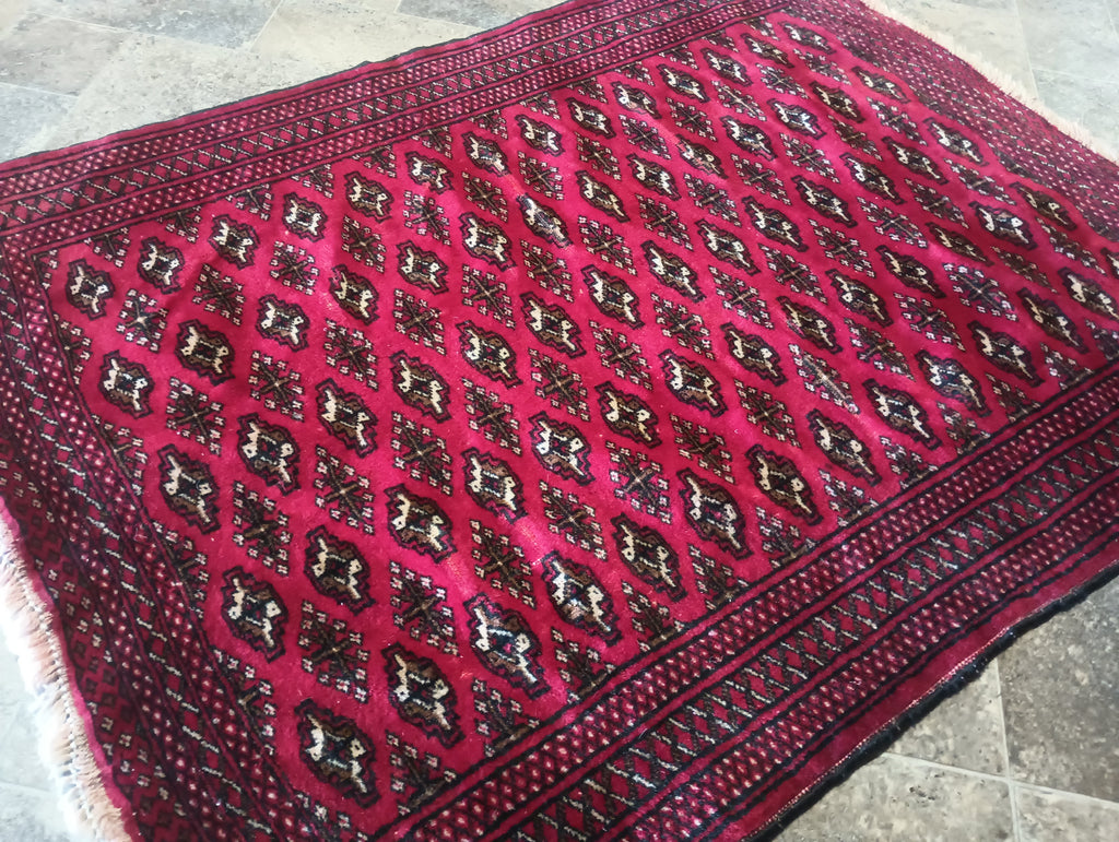 Luxurious-Afghan-Turkman-Bokhara-Rug.jpg