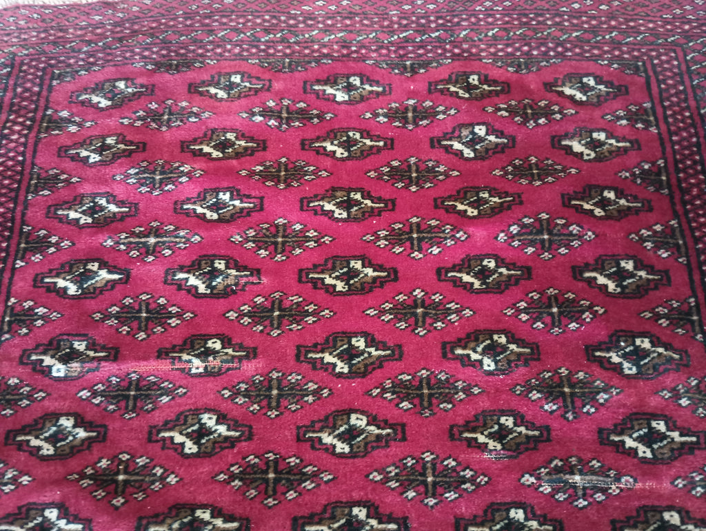 Luxurious-Afghan-Turkman-Bokhara-Rug.jpg