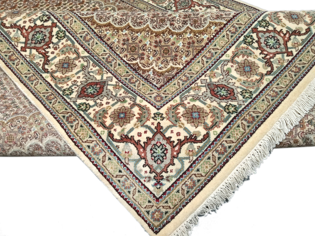  Luxurious-Mahi-Tabriz-Rug.jpg