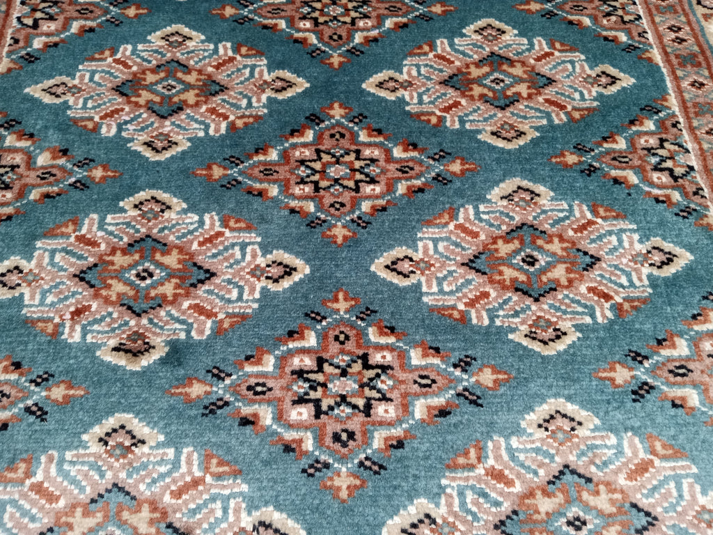 Hand-knotted-Bokhara-Area-Rug.jpg
