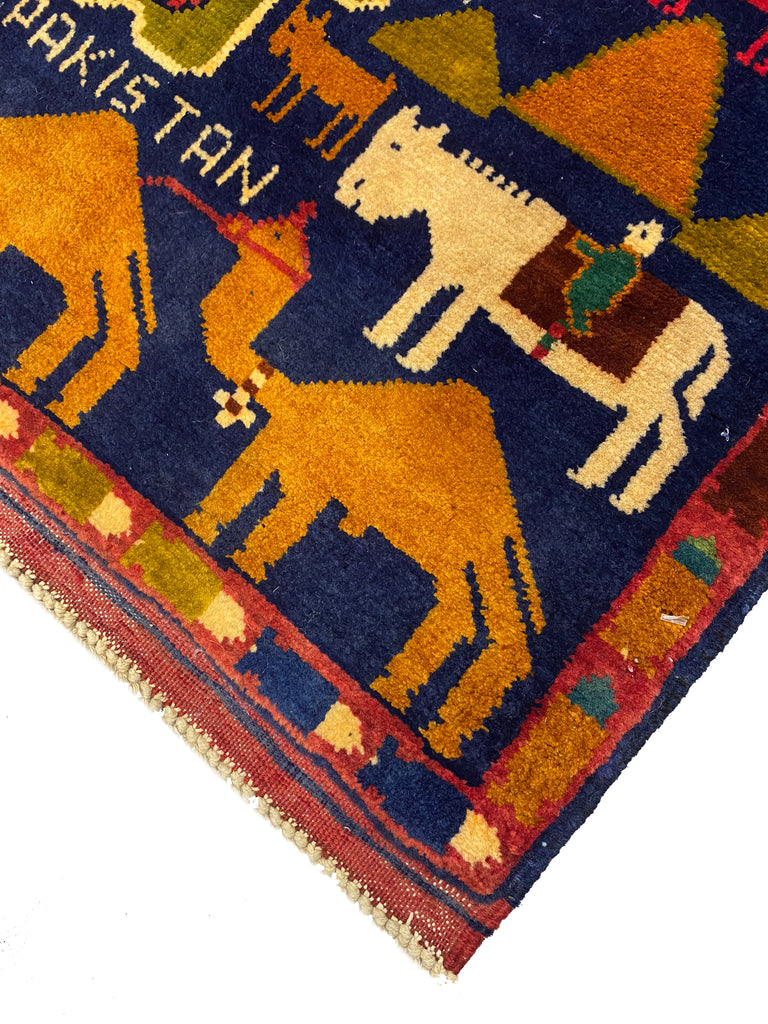 Luxurious-Handmade-Pictorial-Tribal-Rug.jpg