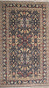 Load image into Gallery viewer, An ornate traditional oriental rug with a dark navy blue field, beige borders, and intricate floral motifs in red, gold, and cream.