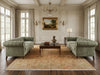 Load image into Gallery viewer, Luxurious living room with green sofas, wooden coffee table, and classical decor.